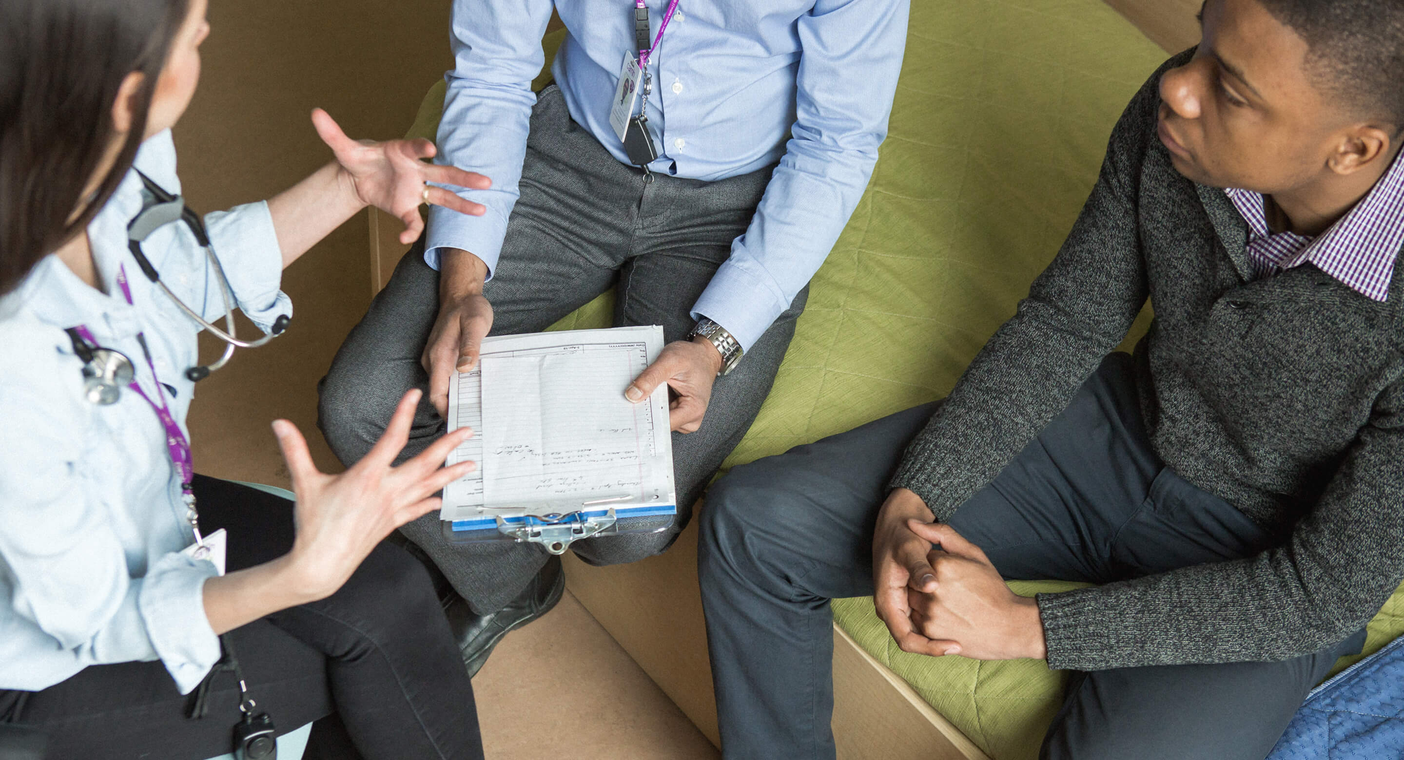 Doctors talking to client