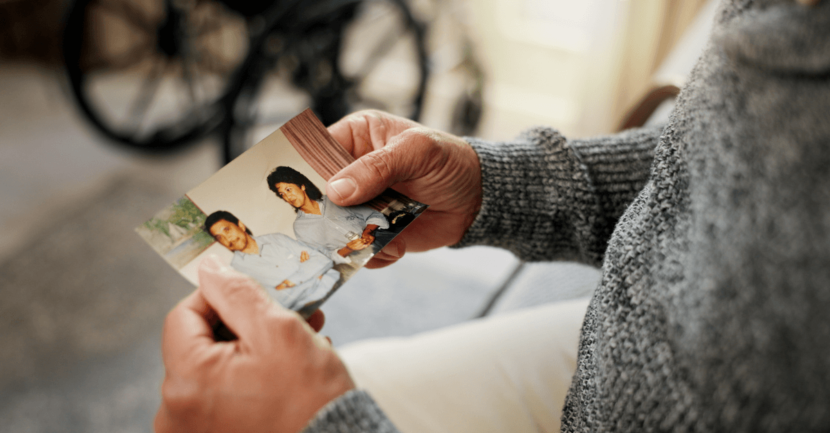 Personal holding a photo