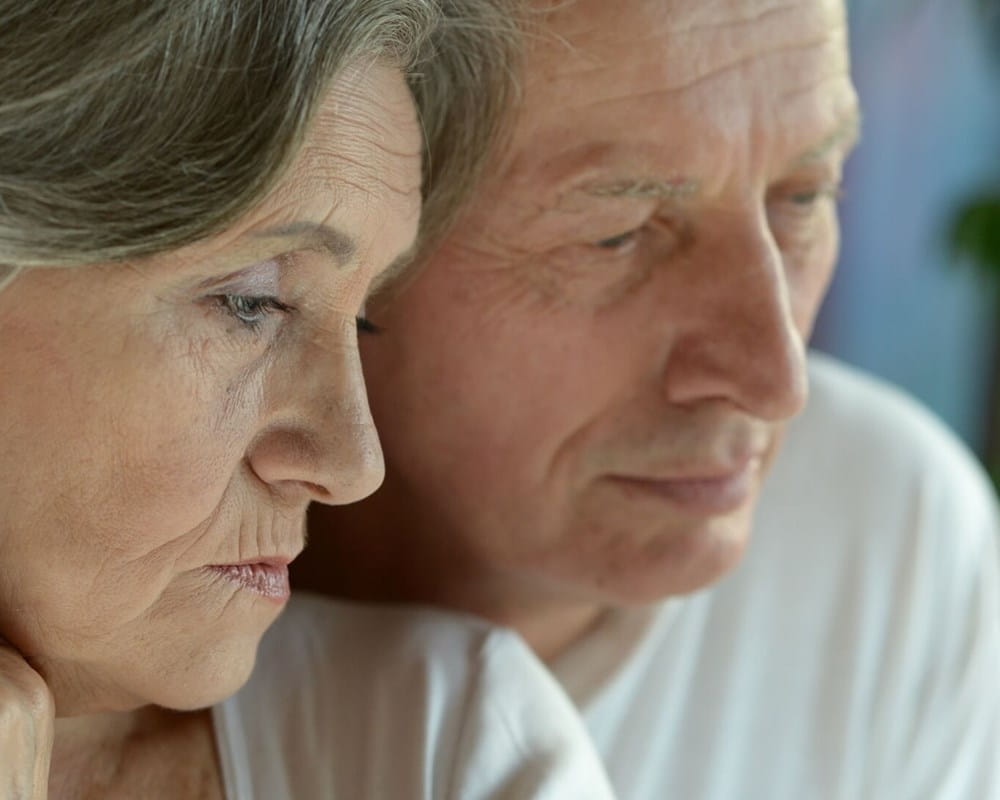 Sad older couple