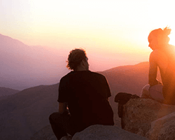 Image of couple watching sunrise