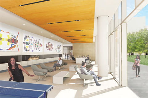 A Client Recovery Mall with chairs, a woman playing at a ping pong table and distinct artwork covering the walls. 