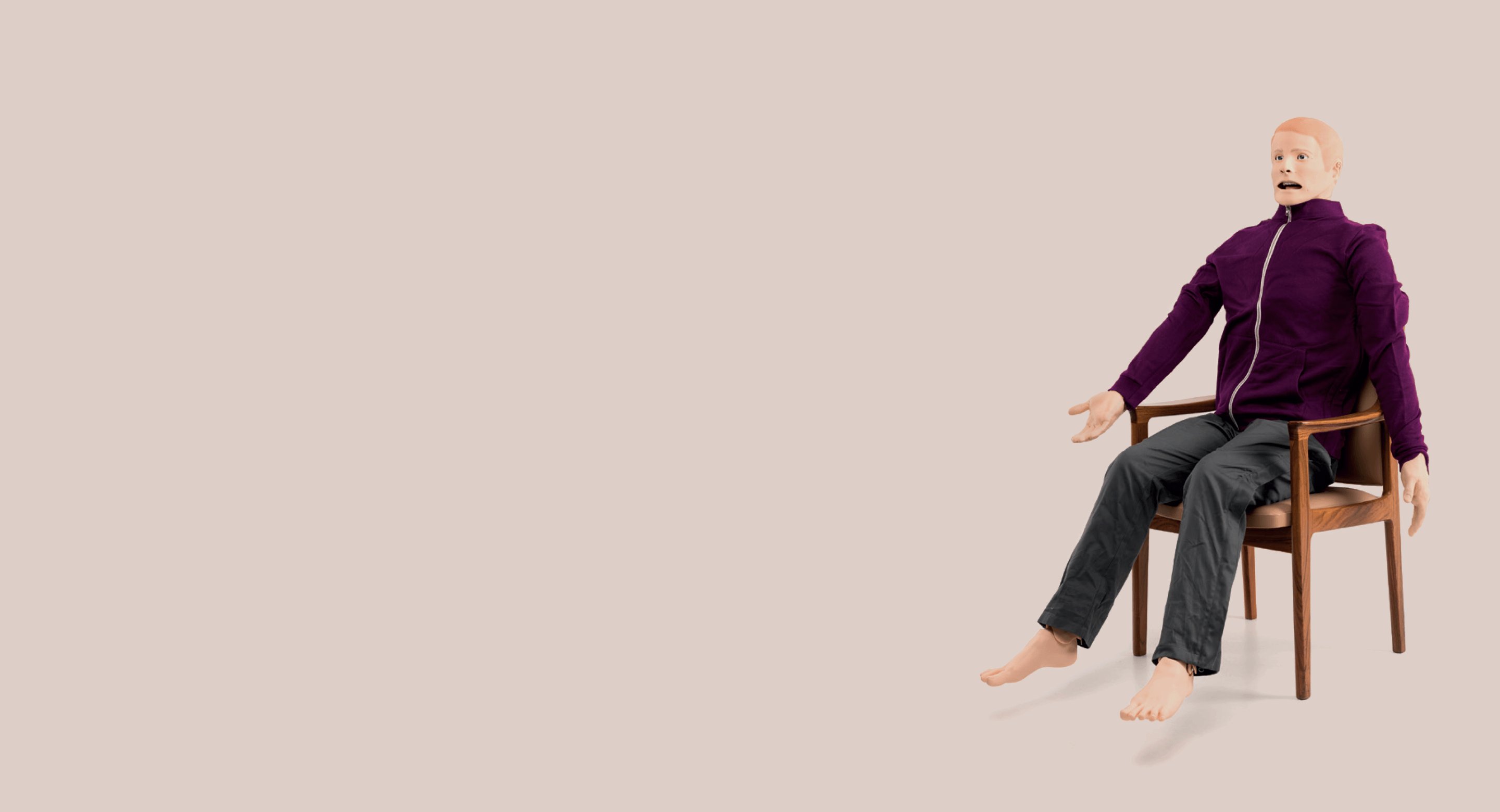 Simpson the SimMan dummy sitting in a chair