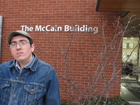 Jason standing in front of the McCain Centre. 