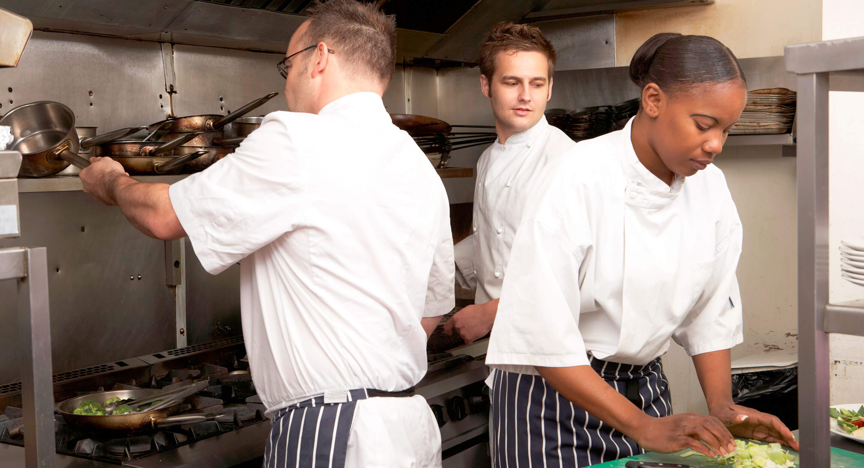 Kitchen staff in restaurant.