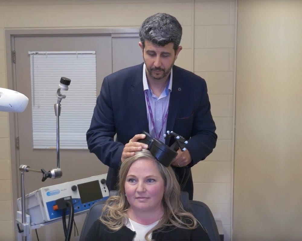Dr. Daniel Blumberger demonstrates intermittent theta burst stimulation
