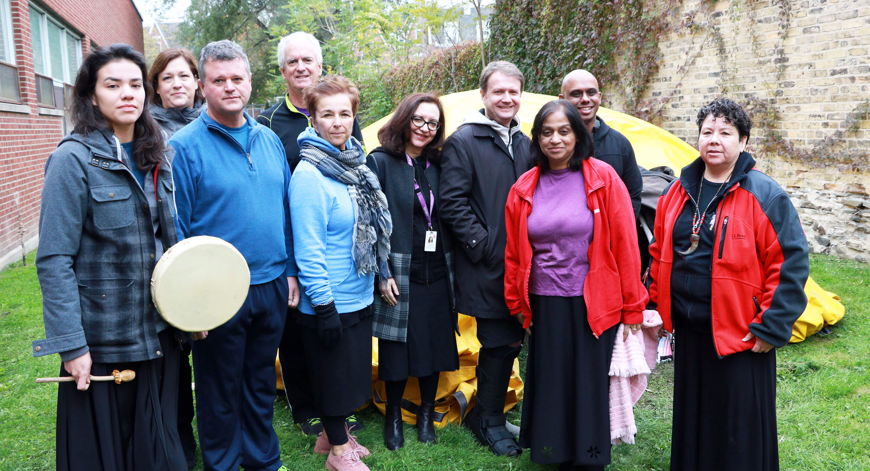 ELT members in front of Sweat Lodge