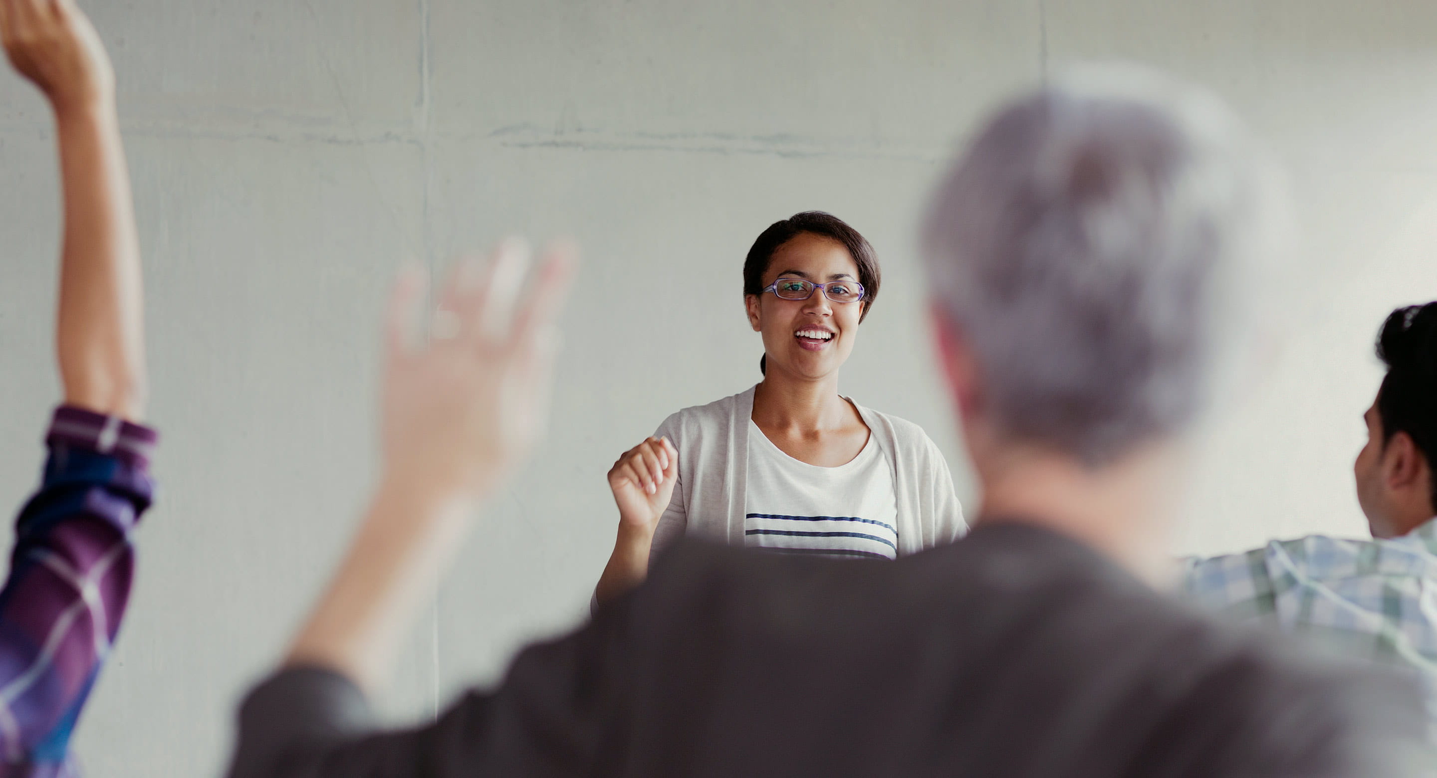 Woman talking to group of people