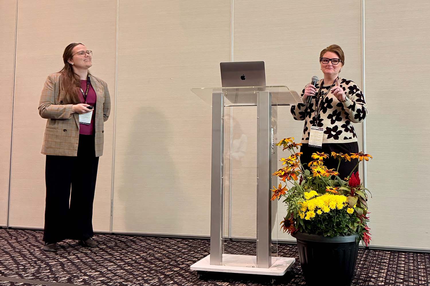 Emily speaking at an event