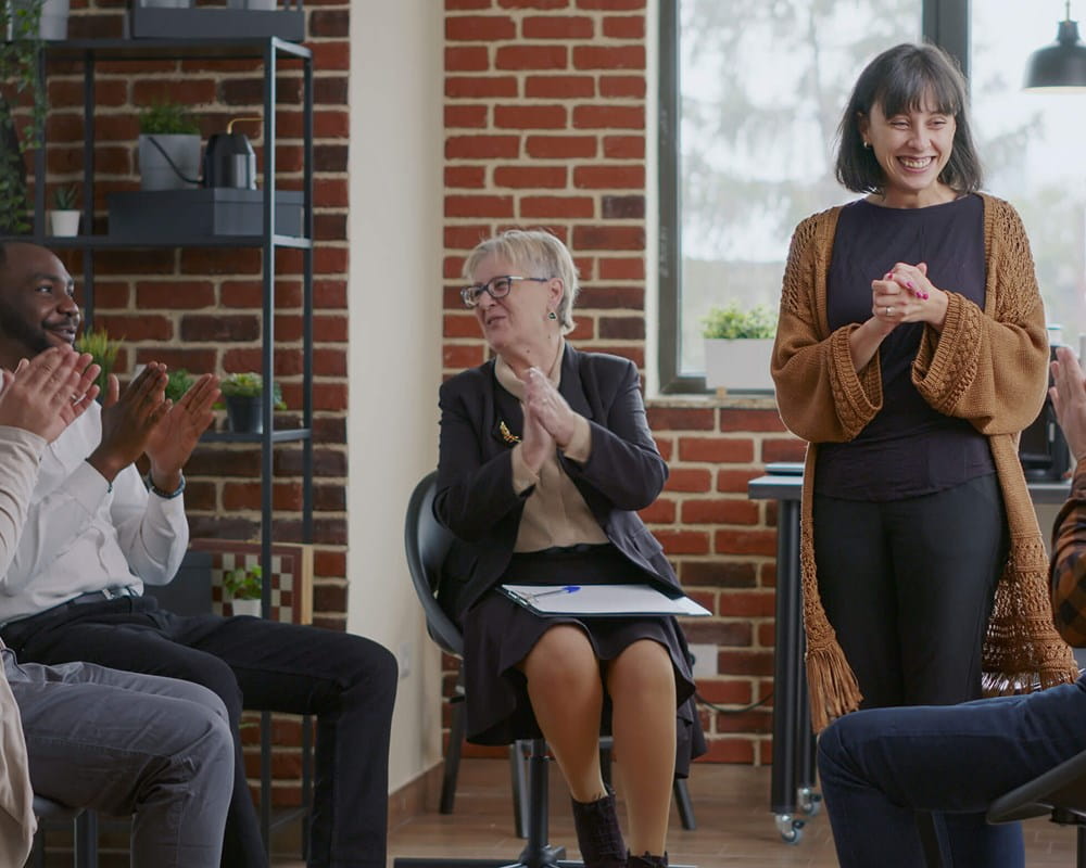 Adults in a group therapy session